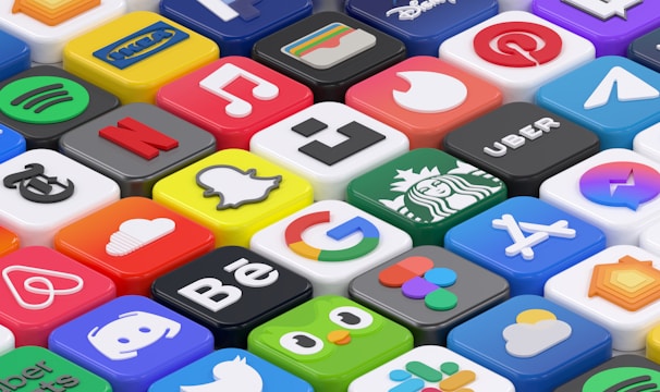 A vibrant grid of colorful game app cards glowing with bright gradients.